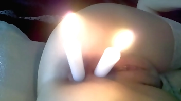 EXTREME - Two candles one in her pussy and one in ass