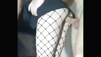 Slender girlfriend in a skirt and stockings fucked while standing in a tight pussy and cum inside her -CalientePWNZ