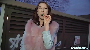 Public Agent Chanel Kiss lollipop sucker is taken from behind after giving a worldclass blowjob