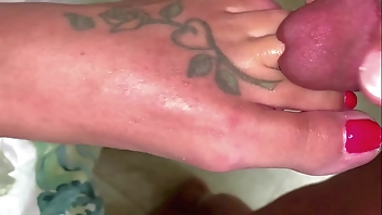 Stuffing her toes into my cock