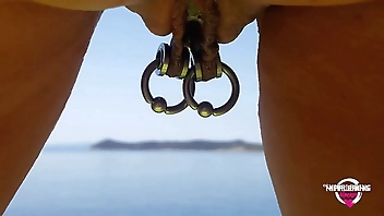 nippleringlover kinky mother double rings in extreme pierced nipples fingering pierced pussy and pissing at nude beach