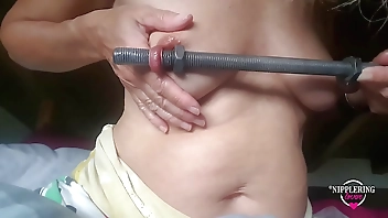 nippleringlover kinky inserting 16mm rod in extreme stretched nipple piercings part1