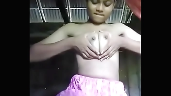 Village girl plays with boobs and pussy