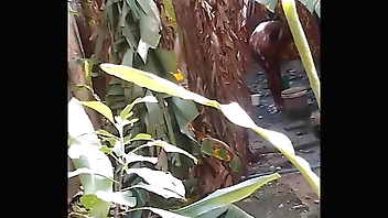 Two lesbians caught on spycam bathing outside