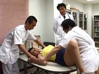 Busty patient gets wild fucked by three doctors in hospital XXX
