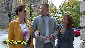 Two Horny Cougars Taking a Stranger Home To Get Their Mature Pussies Filled