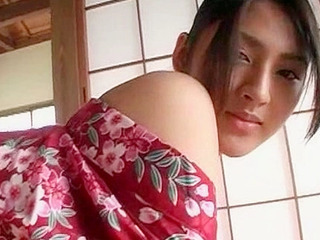 Contorting her adorable and cute body in a Tokyo inn, a Nippon pornstar's kimono-clad posing will make you fap XXX!