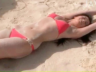 Japanese beach bunny gets horny and fucks XXX millions on the beach
