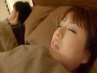 Nipponese milf gets creampied while snoozing hubby in tokyo 'cause she loves XXX and can't resist.