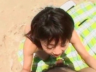 Fucking a horny teen on the beach is the most exhilarating XXX experience in Japan.